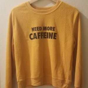 Yellow crop top sweater.